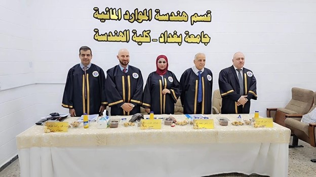 The College of Engineering at the University of Baghdad hosts a defense session for a Master's thesis in the Department of Water Resources Engineering.